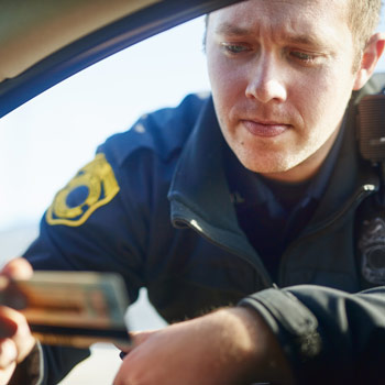 police officer checking id